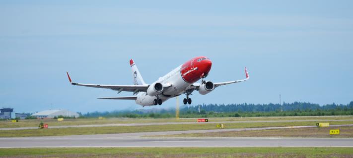 Norwegian Air airplane taking off.