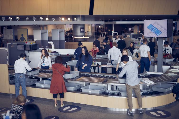 Passengers at security check.