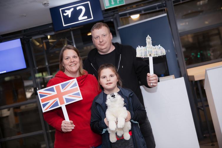 A passenger group picture at the route opening ceremony