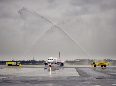 Airplane receiving a water salute.