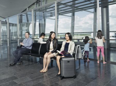 Passengers waiting for their flight. 