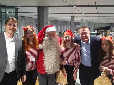 Santa claus and a group of guests at Finnair's route openning