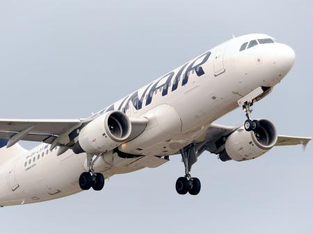 Finnair's airplane in the air.