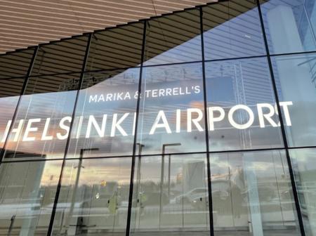 Marika and Terrels name on the Helsinki Airport sign.