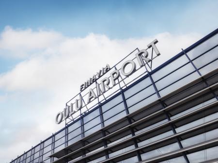 Oulu Airport sign.