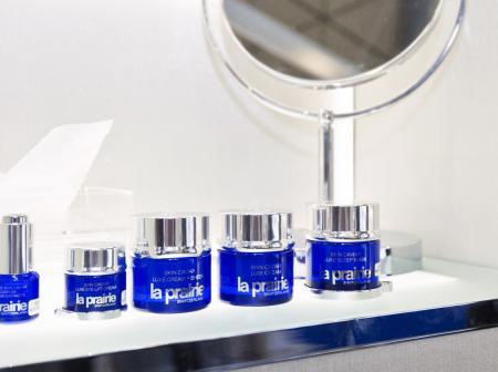 La Prairie cosmetics on a shelf.