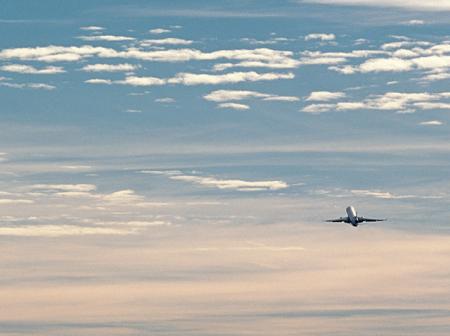 Airplane far away in the sky.