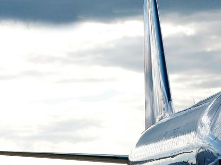 A shiny airframe of an airplane.