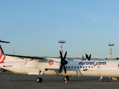 Eurolot airplane at airport.