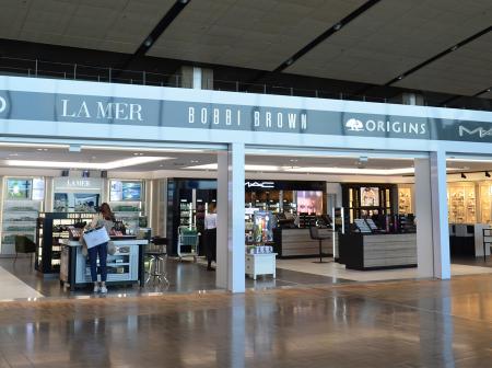 Store front of a multi-brand cosmetics shop at Helsinki airport.