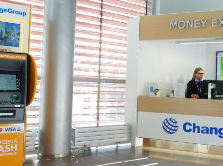 ATM next to Change Group's service counter.