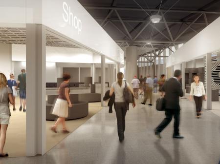 Passengers at airport shopping area.