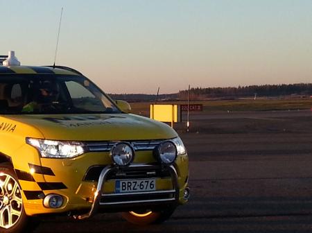 Yellow Mitsubisi Outlander car of Helsinki airport's marshallers.