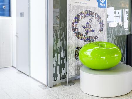 Plan Pastil -charity box at Helsinki airport gate area.