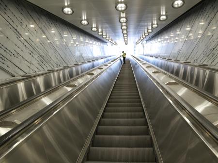 Helsinki airport's train station's escalators.