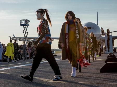 Fashion show finale at Helsinki airport runway.