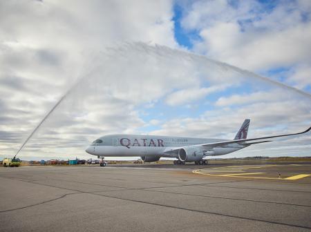 Qatar airplane receiving a water salute.