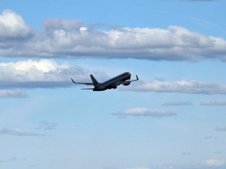 An aeroplane ascending.