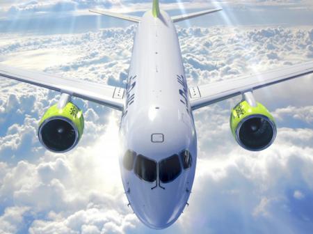 An airplane high above the clouds.