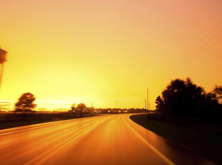Empty road during sunset.