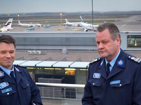 Two police officers at Helsinki Airport.
