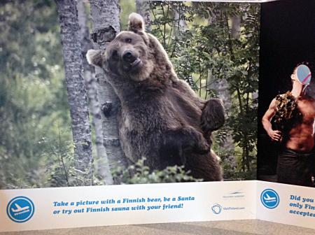 Images of Santa Claus, A bear and two men at sauna.