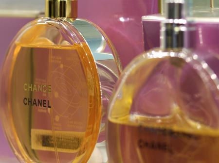 Perfume bottles on store shelf.