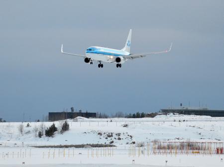 A KLM airplane landing.