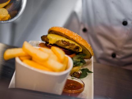 Hamburger with french fries.