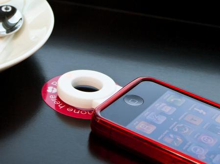 An iPhone on a table.