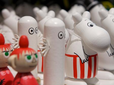 Wooden Moomin figures.