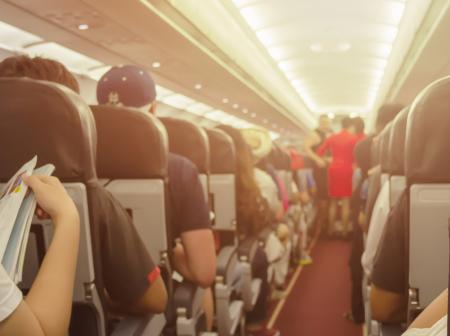 A aisle inside an aeroplane