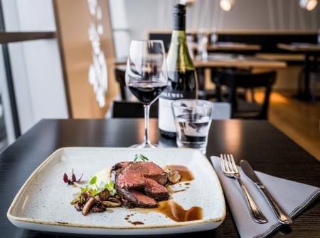 Reindeer roast on a plate.