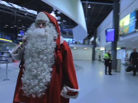 Santa Claus at airport departure hall.