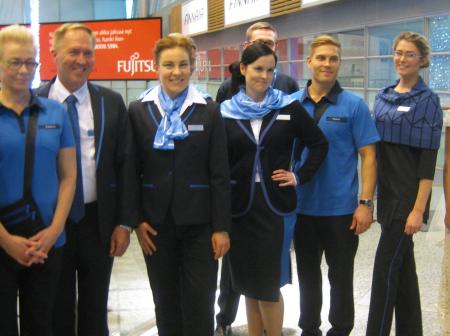 Finavia staff wearing their new uniforms.