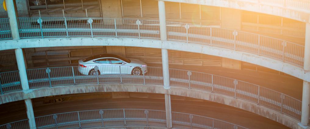 Car is driving in the parking hall