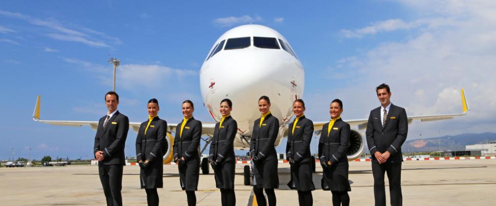 Vueling staff in front of the plane
