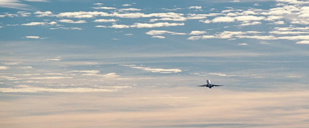 Airplane far away in the sky.