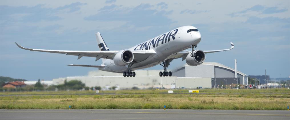 Finnair Airbus A350 taking off on a clear day.
