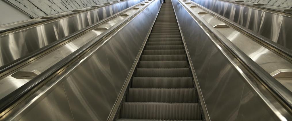 Helsinki airport's train station's escalators.