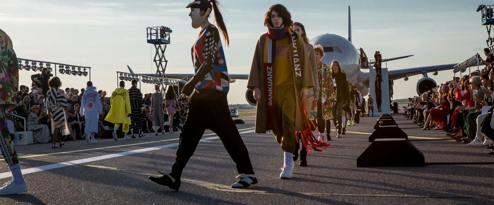 Fashion show finale at Helsinki airport runway.