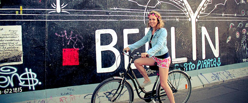 A woman riding a bike.