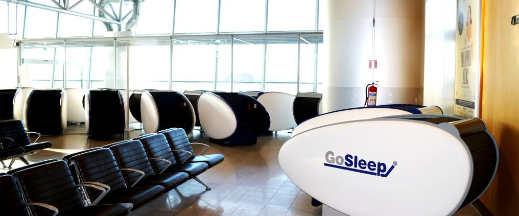 Sleeping capsules at Helsinki airport's gate area.