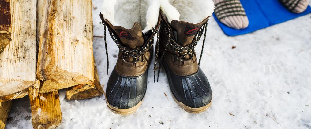 Warm winter boots on snow.