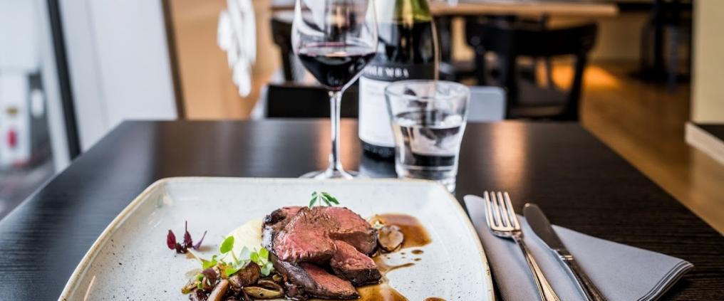 Reindeer roast on a plate.