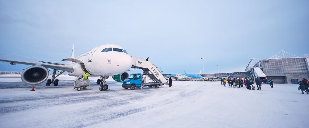 Aeroplane at snowy airport.