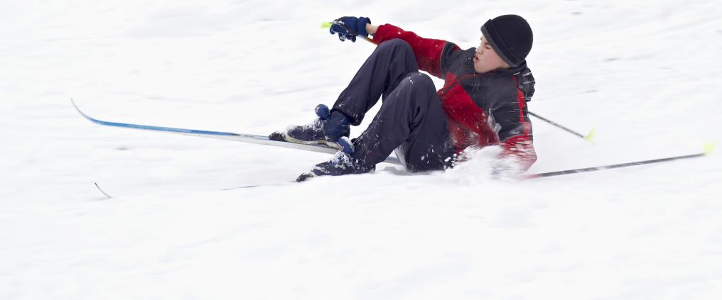 Skier is falling on a slope.
