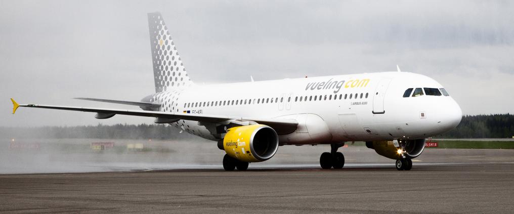 A Vueling airplane at runway.