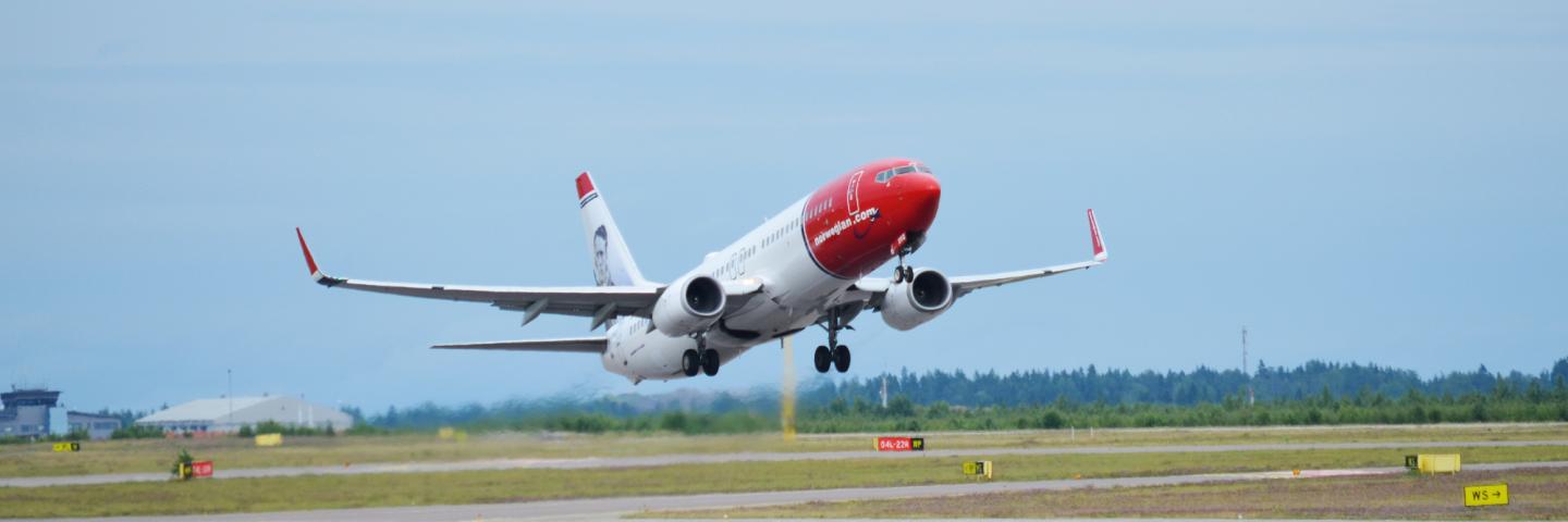 Norwegian Air airplane taking off.