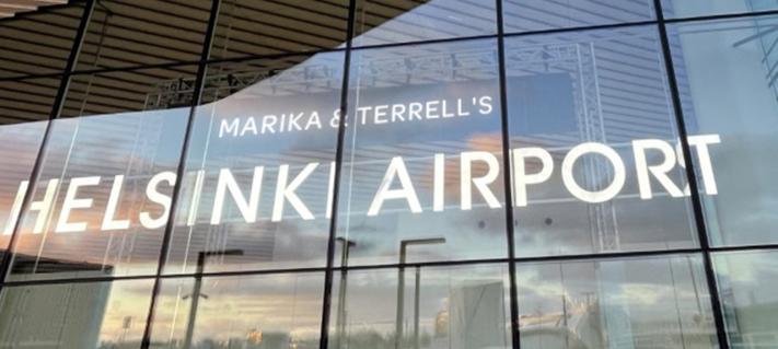 Marika and Terrels name on the Helsinki Airport sign.